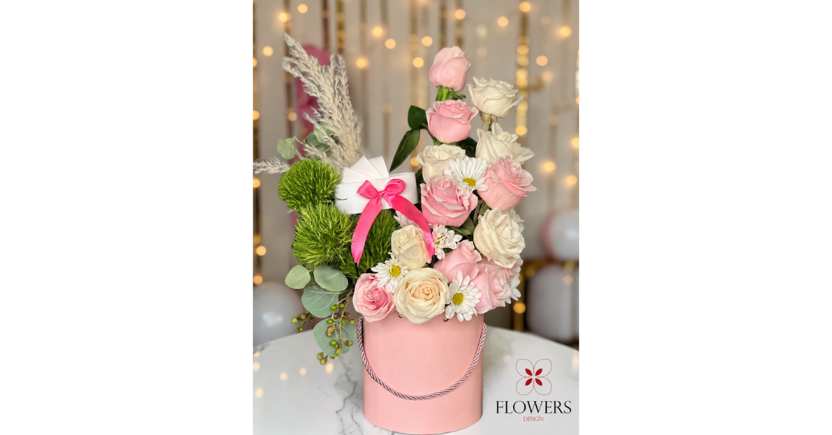 Elegant pink and white birthday flower bouquet with roses and daisies handcrafted by Flowers Design in Sylvan Lake, Alberta.